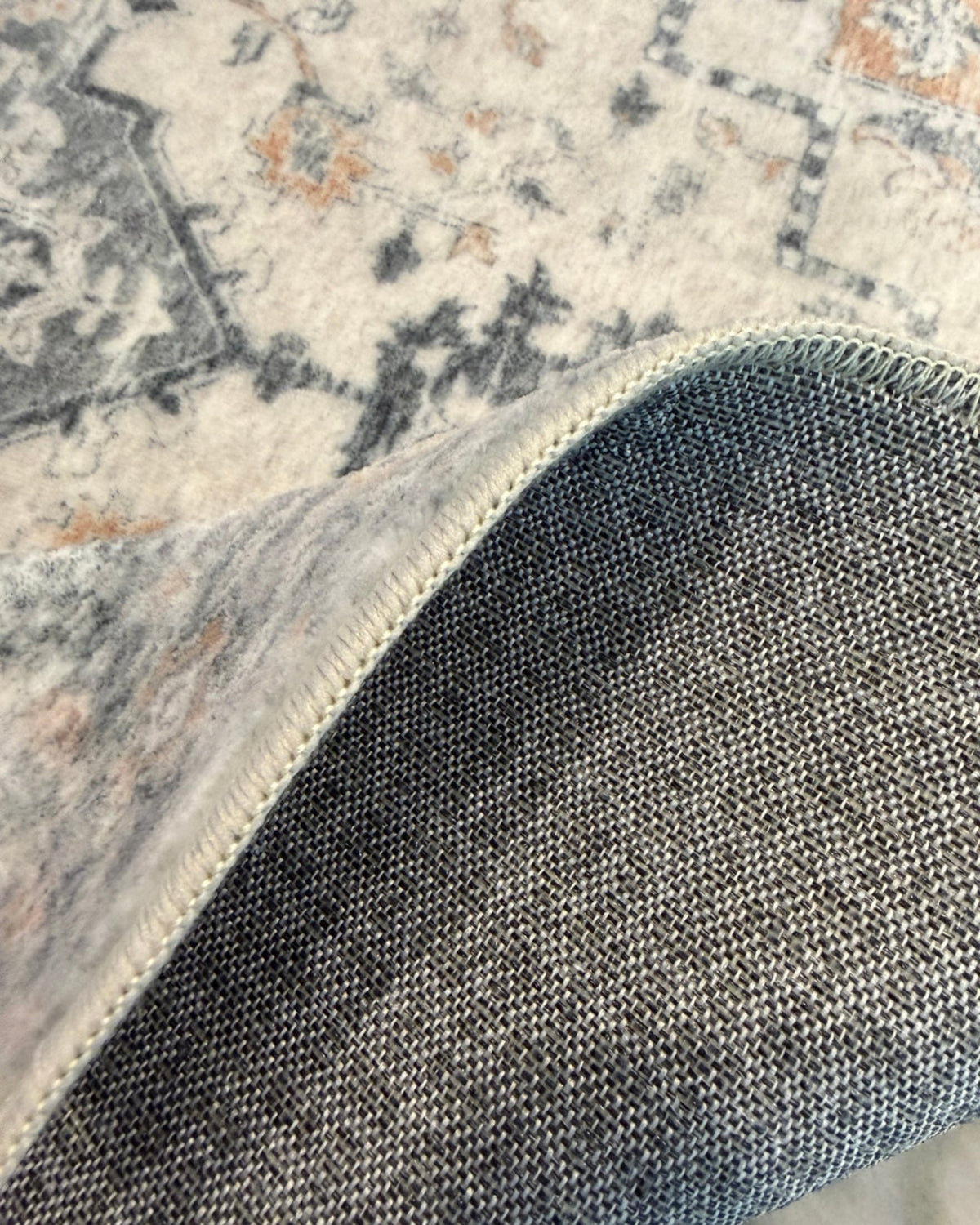 GEMINO Light Taupe Brown 2x5 washable runner rug in a kitchen showing back grip